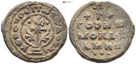 Byzantine Lead Seal. (26mm, 6.33 g) Obv: Patriarchal cross with floral ornaments springing from base. Rev: Legends in four lines.