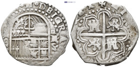 SPAIN. Philip II. 1556-1598. AR 2 Reals (29mm, 6.77 g). Seville mint. Crowned royal coat-of-arms, lis between crown and shield; S and II across field ...