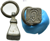 Byzantine bronze stamp seal. Conical-shaped seal, loop at top for suspension. Saint? Bust. (21mm, 9.42 g)