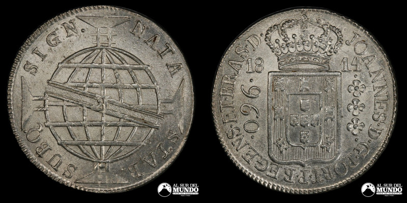 Brasil, Bahia. 960 Reis. 1814. Anverso: Cinta con marca de ceca superpuesta a gl...