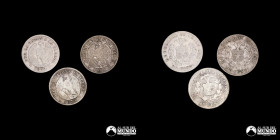 Chile, Santiago. Lote de tres monedas de plata: 20 Centavos "Aguila". 1879 (2) y 1881.