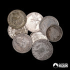 Lote de ocho monedas mundiales de plata a clasificar. Siglos XIX-XX.