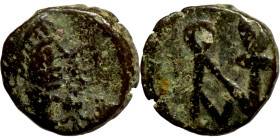 Antik coin bronze

8mm 0,49g