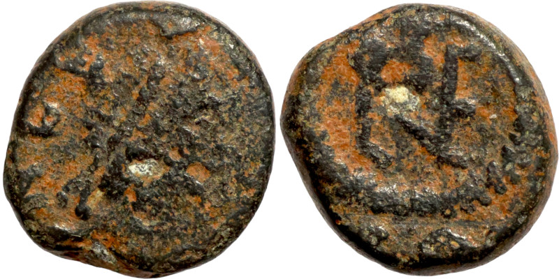 Antik coin bronze

10mm 1,18g