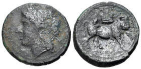 Italy, Northern Campania, Cales, c. 265-240 BC. Æ (21mm, 6.50g, 8h). Laureate head of Apollo l.; behind, uncertain symbol / Man-headed bull r., lyre a...