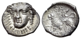 Italy, Southern Campania, Phistelia, c. 325-275 BC. AR Obol (10mm, 0.62g, 12h). Head of nymph facing slightly l. / Lion crouching l.; eight-rayed star...