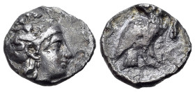 Italy, Southern Apulia, Tarentum, c. 302-280 BC. AR Drachm (16mm, 2.38g, 6h). Helmeted head of Athena r., helmet decorated with Skylla throwing stone....