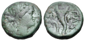 Italy, Northern Lucania, Paestum, 218-201 BC. Æ Triens (17mm, 4.44g, 12h). Female head r. wearing ivy wreath; four pellets to l. R/ Cornucopia; four p...