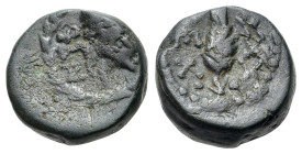 Italy, Northern Lucania, Paestum, early 1st century BC. Æ Triens (12mm, 3.38g, 12h). Heads of the Dioscuri r. within wreath. R/ Grain ear. Crawford, P...