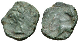 Central Italy, Uncertain mint, early 1st century. Æ (18mm, 4.14g, 4h). Wreathed head of young Dionysos r. / Panther standing r., head facing, holding ...