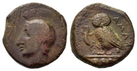 Sicily, Kamarina, c. 420-405 BC. Æ Tetras (14mm, 2.54g). Helmeted head of Athena l. R/ Owl standing l., head facing, clutching lizard with r. talon. C...