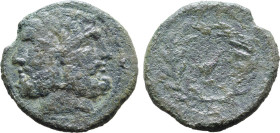 Sicily, uncertain mint under Roman Rule, c. 200-190 BC. Æ As (6.17g, 22mm, 12h). Laureate and bearded head of Janus; I (mark of value) above R/ Dove s...