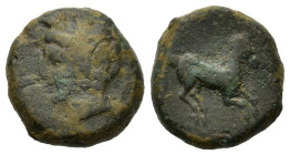 Zeugitania, Carthage, c. 400-350 BC. Æ (16,3mm, 6.3g). Uncertain mint in Sicily or Carthage. Wreathed male head to left, wearing earrings. R/ Horse ga...