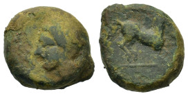 Zeugitania, Carthage, c. 400-350 BC. Æ (17mm, 5.9g). Uncertain mint in Sicily or Carthage. Wreathed male head to left, wearing earrings. R/ Horse gall...