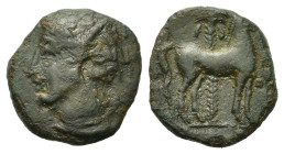 Zeugitania, Carthage, c. 400-350 BC. Æ Unit (13,7mm, 1.6g). Wreathed head of Tanit left. R/ Horse standing right; palm tree in background. CNP 194; MA...