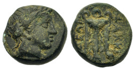 Macedon. Chalkidian League. Olynthos, c. 432-348 BC. Æ (12mm, 1,72 g). Laureate head of Apollo to right. R/ Tripod; ΧΑΛΚΙ-ΔΕΩΝ around. SNG ANS 561; HG...