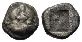 Macedon, Neapolis, c. 525-480 BC. AR Obol (8.9mm, 0.95g). Thasian standard. Head of gorgoneion facing, with tongue protruding. R/ Rough incuse square....