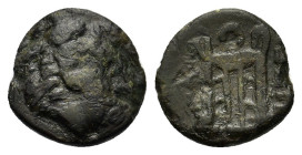 Macedon, Philippi (as Thasian Epeiros, Krenides), c. 360-356 BC. Æ (11mm, 1g). Head of Herakles to right, wearing lion skin headdress.
R/Tripod; [ΘΑΣΙ...