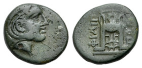 Macedon, Philippi, c. 356-345 BC. Æ (11mm, 1.20g, 12h). Head of Herakles r., wearing lion skin. R/ Tripod. SNG ANS 668-671; HGC 3.1, 634. Green patina...