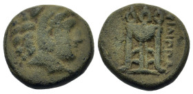 Macedon, Philippi, c. 356-345 BC. Æ (16,4mm, 5.2g). Head of Herakles right, wearing lion’s skin. R/ Tripod; to left, monogram above grain ear. Belling...