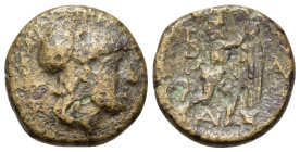 Kings of Macedon. Antigonos II Gonatas. (277/6-239 BC). Æ (19mm, 6.08g). Uncertain Macedonian mint. Helmeted head of Athena r. R/ Pan standing r., ere...