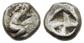 Thraco-Macedonian Region. Bisaltia, Berge, c. 525-500 BC. AR 1/8 Stater (8,5mm, 1.3g). Doghead satyr, crouching to right, holding green ear. R/ Quadri...