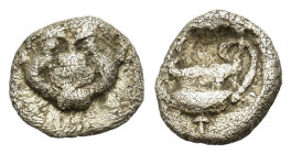 Thraco-Macedonian Region. Uncertain mint. Circa 5th century BC. AR Hemiobol (7,4mm, 0,33g). Facing gorgoneion, with tongue protruding. R/ Kantharos wi...