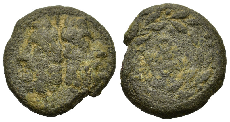 Uncertain Greek. Æ (22,5mm, 7.7g). Wreathed head l. R/ Legend within wreath.