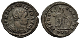 Constantine I (307/10-337). Æ Follis (18,6mm, 2g). Treveri, AD 310/1. Laureate and cuirassed bust r. R/ Mars standing facing, head right, holding inve...