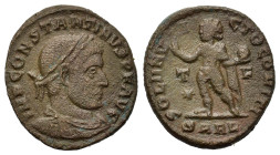 Constantine I (307/10-337). Æ Follis (18,2mm, 3.4g). Arles. Laureate, draped, cuirassed bust r. R/ Genius standing left, naked but for chlamys over le...