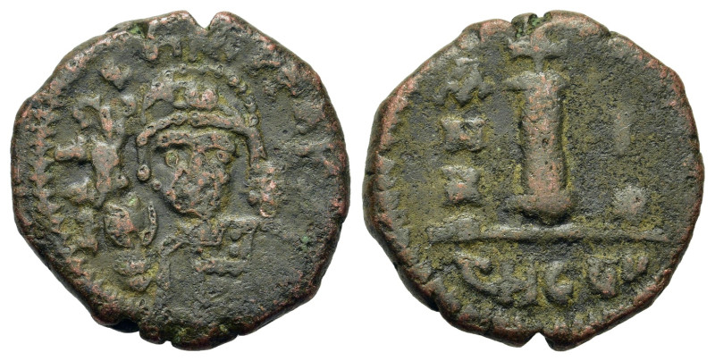 Justin II (565-578). Æ 10 Nummi (18,8mm, 4g). Antioch, year 1 (AD 565/6). Helmet...