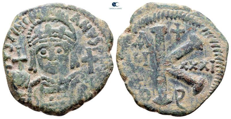 Justinian I AD 527-565. Theoupolis (Antioch)
Half Follis or 20 Nummi Æ

28 mm...