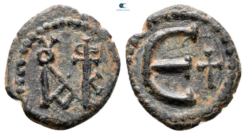 Justin II AD 565-578. Theoupolis (Antioch)
Pentanummium Æ

15 mm, 1,54 g

...