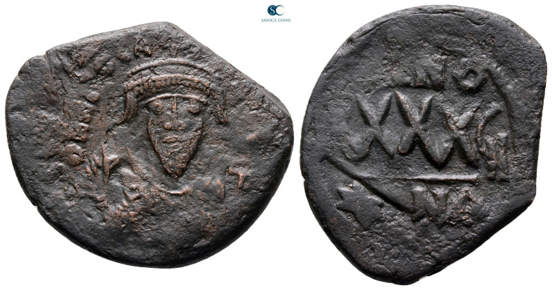 Phocas AD 602-610. Constantinople
Follis or 40 Nummi Æ

32 mm, 11,37 g


...