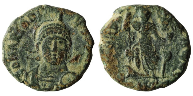 Arcadius. (401-403 AD). Follis. Antioch. Obv: DN ARCADIVS PF AVG. helmeted bust ...