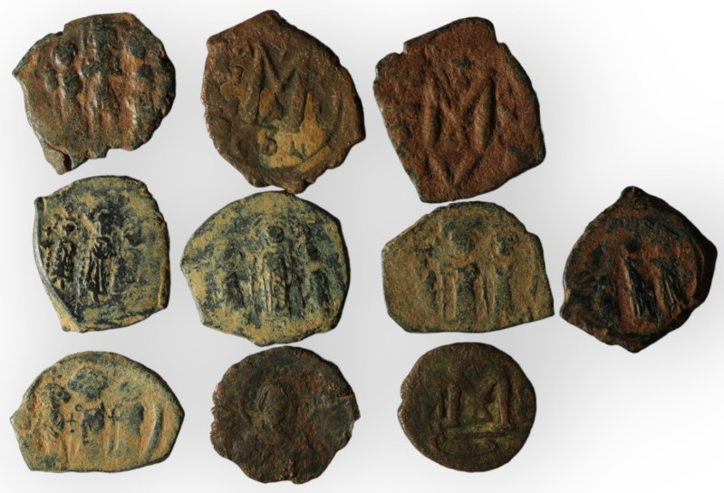 Lot of 10 byzantine bronze coins. artifcial sandpatina. sold as seen, no return....