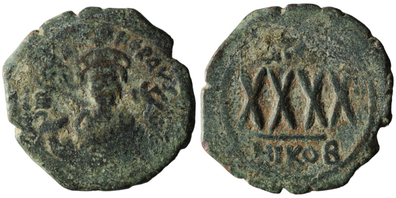 Phocas. (605-606 AD). Æ 40 Nummi. Nikomedia. Obv: bust of Phocas facing. Rev: AN...