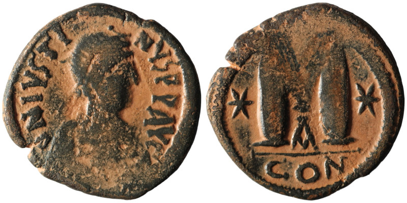 Justin I. (518-527 AD) Æ Follis. Constantinople. Obv: D N IVSTINVS P P AVG. diad...