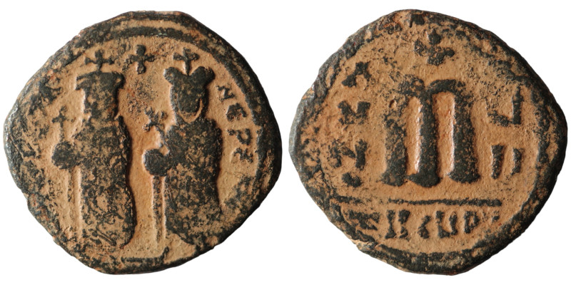 Phocas and Leonita. (602-610 AD) Æ Follis. Theoupolis. Obv: Phocas and Leonita s...