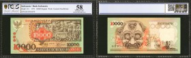 INDONESIA. Bank Indonesia. 10,000 Rupiah, 1975. P-115. PCGS GSG Choice About Uncirculated 58.

Vibrant green and orange color with a watermark of Ge...
