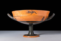 RARE ATTIC BLACK FIGURE KYLIX WITH A RIDER

 Ca. 565 - 550 BC An elegant Attic kylix (drinking cup). The vessel presents a classic form with a deep ...