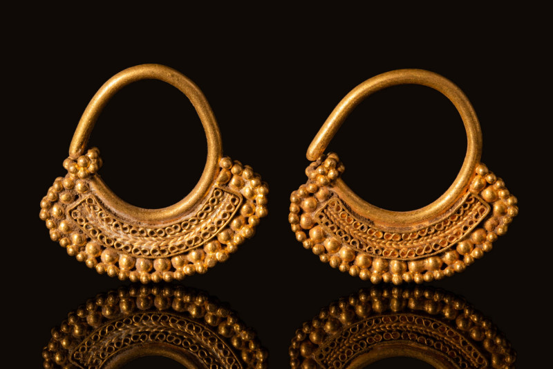 HELLENISTIC GOLD OPENWORK EARRING 

 Ca. 300 - 100 BC A pair of Hellenistic go...