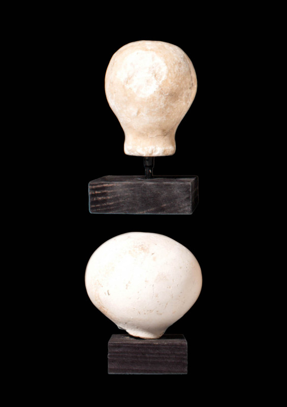 GROUP OF TWO EGYPTIAN ALABASTER MACE HEADS

 Ca. 2700 - 2500 BC A group of two...