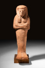 EGYPTIAN TERRACOTTA USHABTI

 New Kingdom, Ca. 1190 - 1069 BC A remarkable Egyptian New Kingdom example of a terracotta ushabti. The figure stands i...