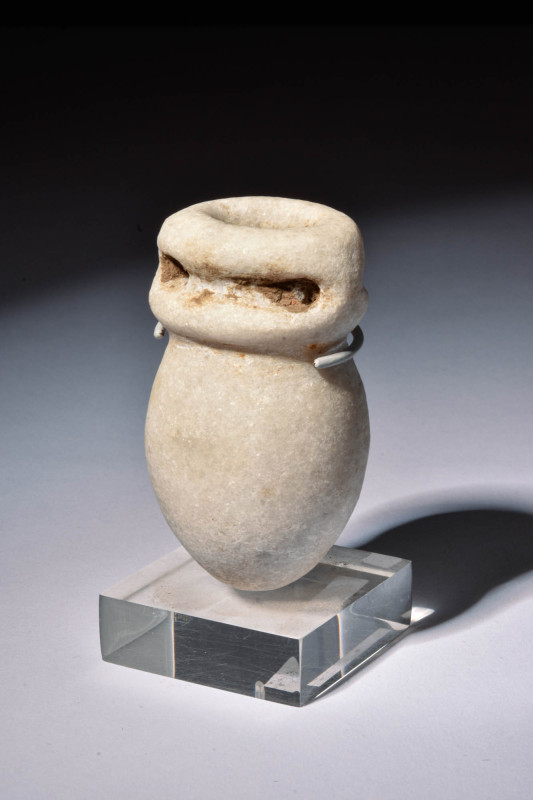 EGYPTIAN STONE OFFERING VASE

 Ca. 664 - 332 BC An Egyptian stone offering vas...