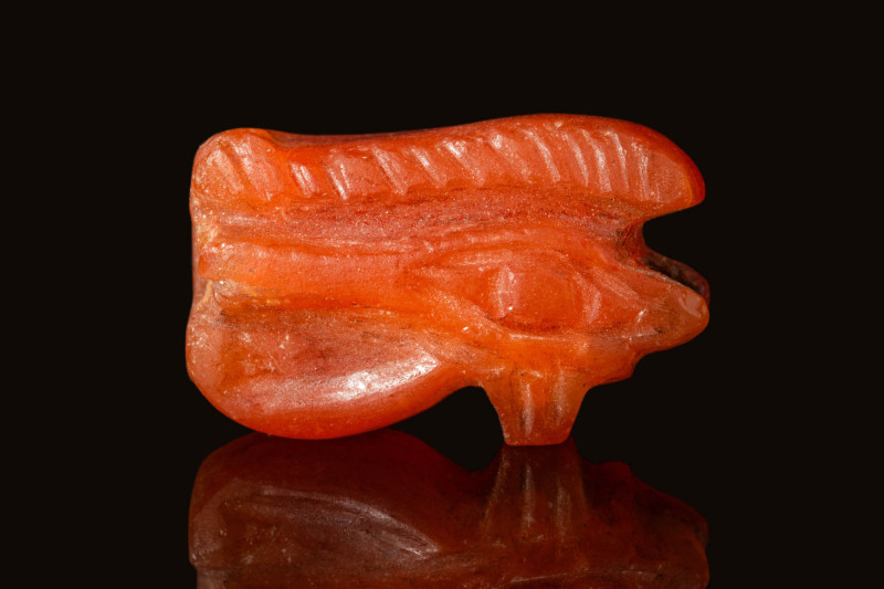 EGYPTIAN CARNELIAN EYE OF HORUS AMULET

 Late Period, Ca. 664 - 332 BC An Egyp...