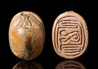 EGYPTIAN SCARAB OF FAWN STONE

 Ca.1700 - 1550 BC An Egyptian steatite scarab. The beetle rests on a low base, and the object is pierced front to ba...