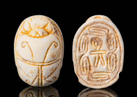 EGYPTIAN STEATITE SCARAB WITH STYLISED SCROLL BORDER

 Second Intermediate Period / Hyksos period, Ca. 1700 - 1550 BC An Egyptian Second Intermediat...