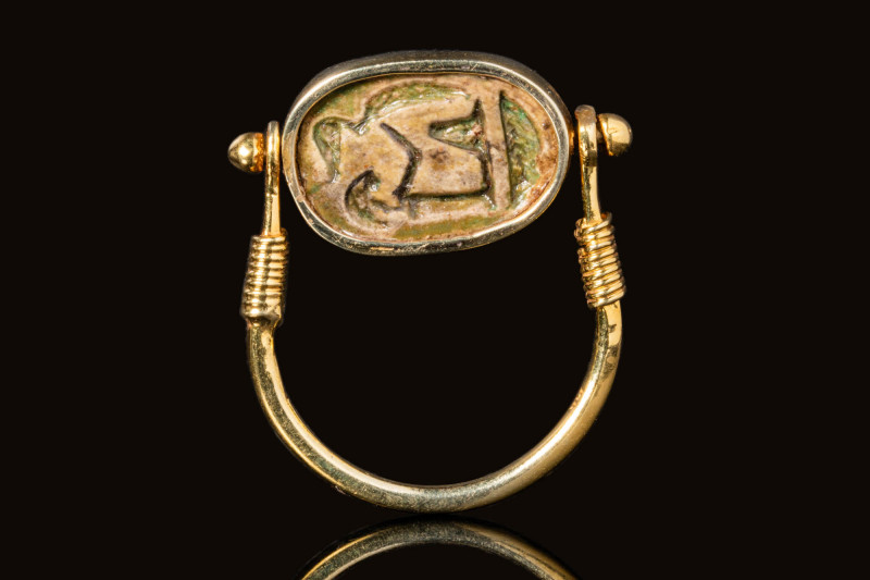 EGYPTIAN STEATITE SCARAB IN LATER GOLD RING 

 New Kingdom, Ca. 1550 - 1069 BC...