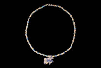 EGYPTIAN LAPIS LAZULI NECKLACE WITH EYE PENDANT

 Ca. 664 - 332 BC An Egyptian late period necklace made from ancient lapis Lazuli beads comprising ...